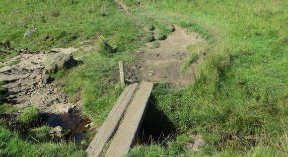 Wooden-platform-over-running-water