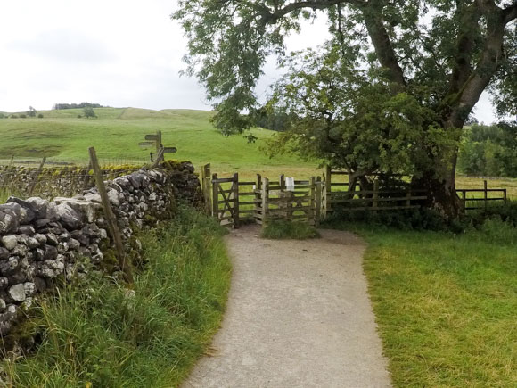 Gate and signpost to Janets Foss